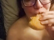 Laying down Eating a Burger